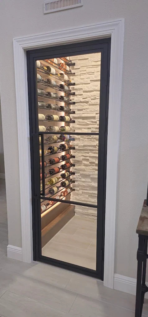 Matte black 3 Lite steel French door with clear glass at the entrance of a wine room, Florida