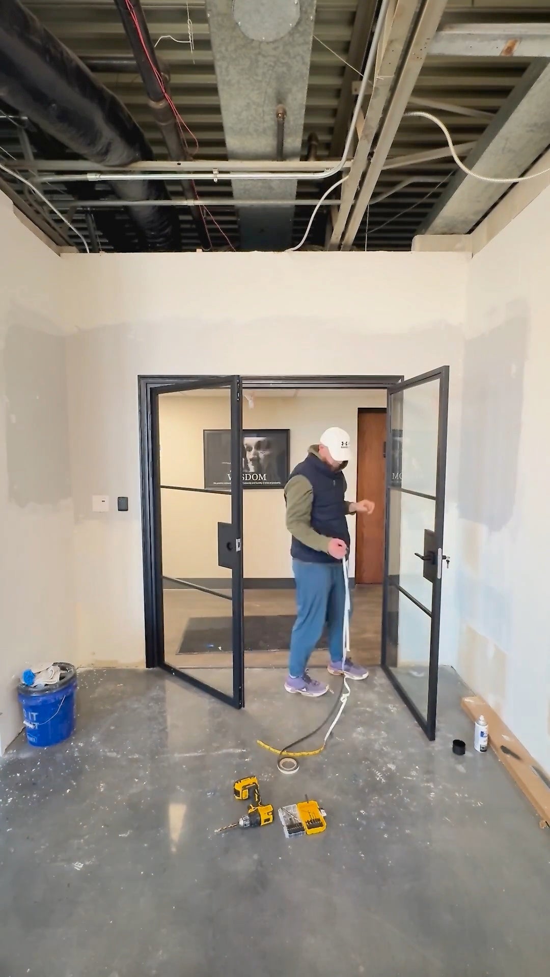 Replacing an office door with steel and glass double doors